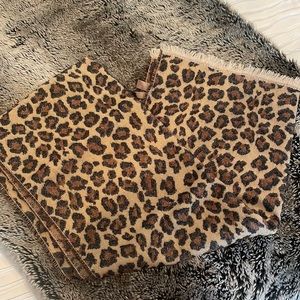 Super soft oversized leopard scarf with fringe.